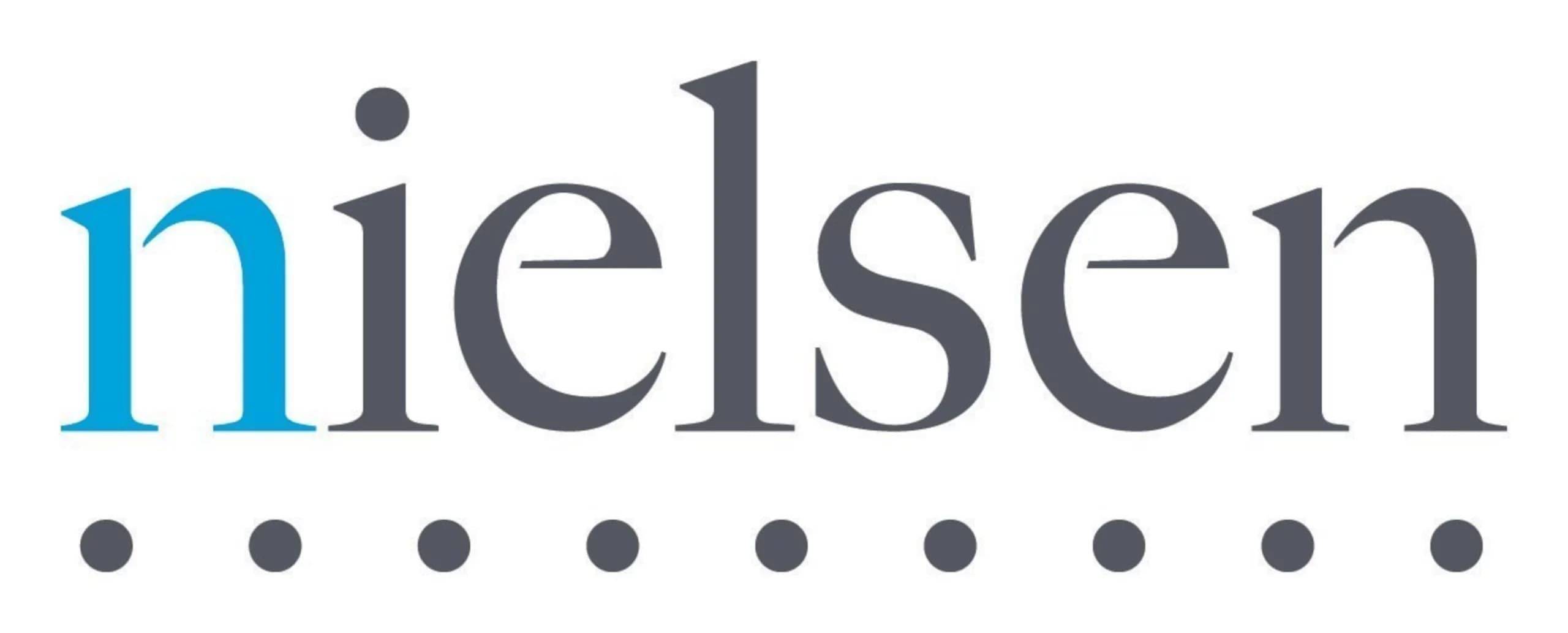 Logo of Nielsen, featuring the company name in lowercase blue and gray letters, with three gray dots below the text.